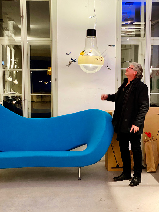 Ingo Maurer giant insect lamp with Graham Owen in Munich showroom