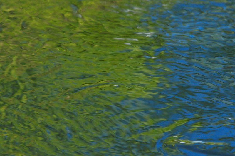blue and gree river reflection