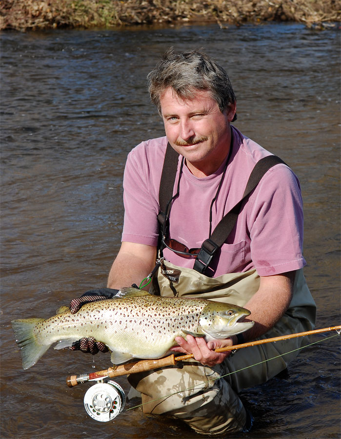 Graham and his fish posing for a photograph