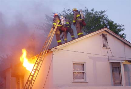 The two story house next door was also set ablaze